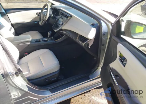 2018 Toyota Avalon Hybrid Xle z USA, uszkodzony, nr VIN 4T1BD1EB9JU063875